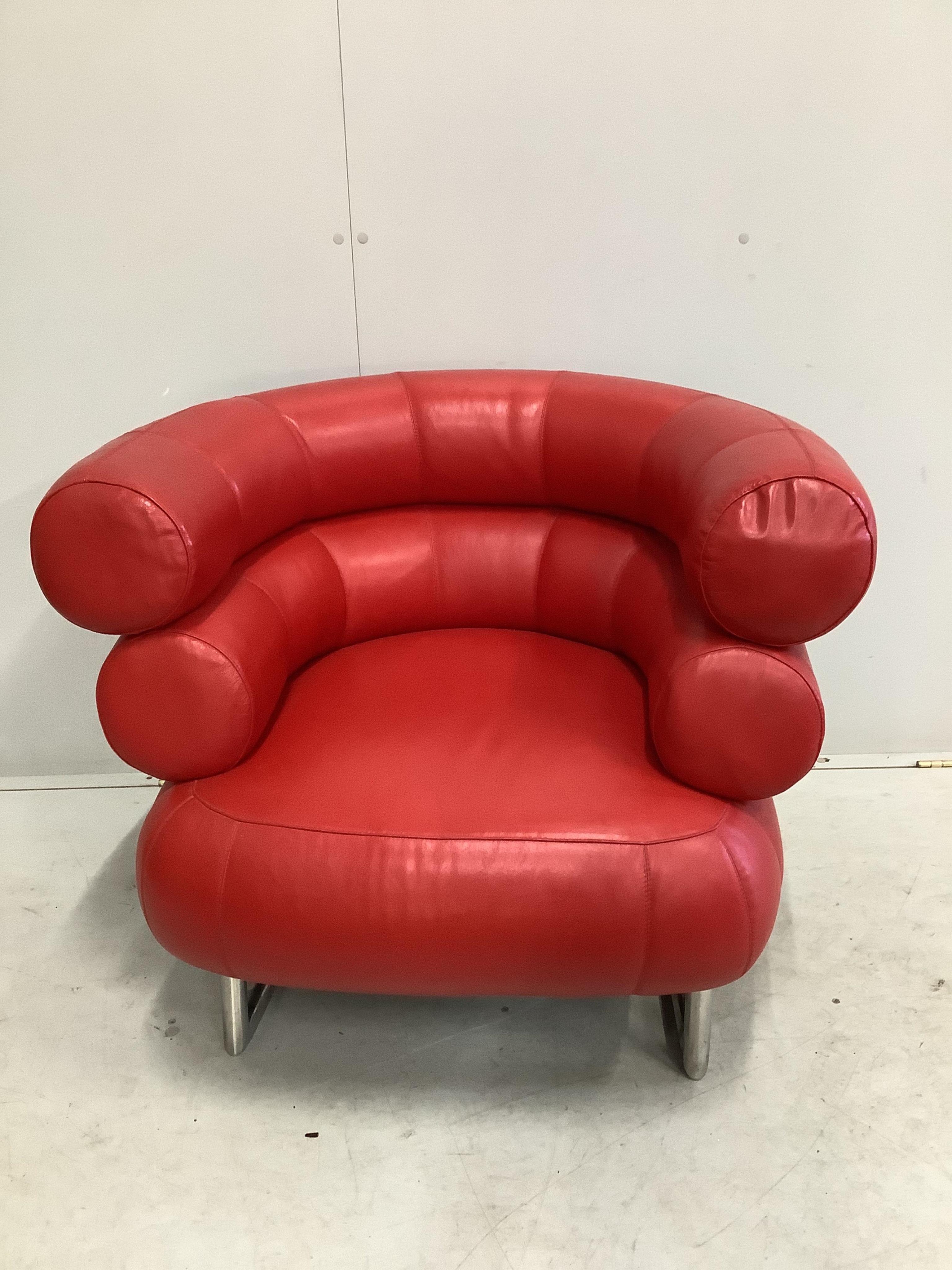 A Contemporary Eileen Gray Bibendum red leather armchair, width 92cm, depth 74cm, height 74cm. Condition - good